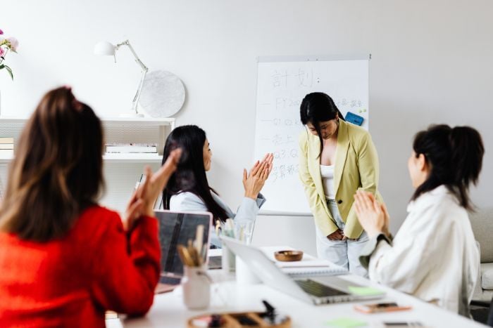 a-woman-being-praised