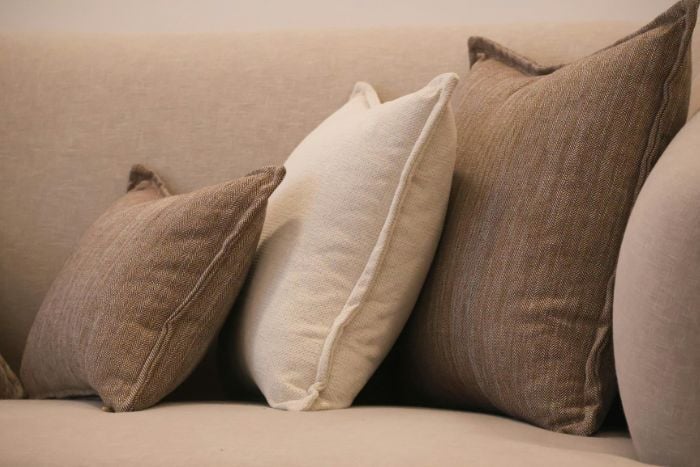 cozy-sofa-with-neutral-colored-throw-pillows
