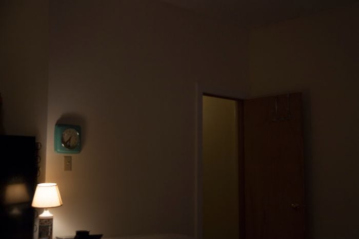 dimly-lit-room-with-a-wall-clock