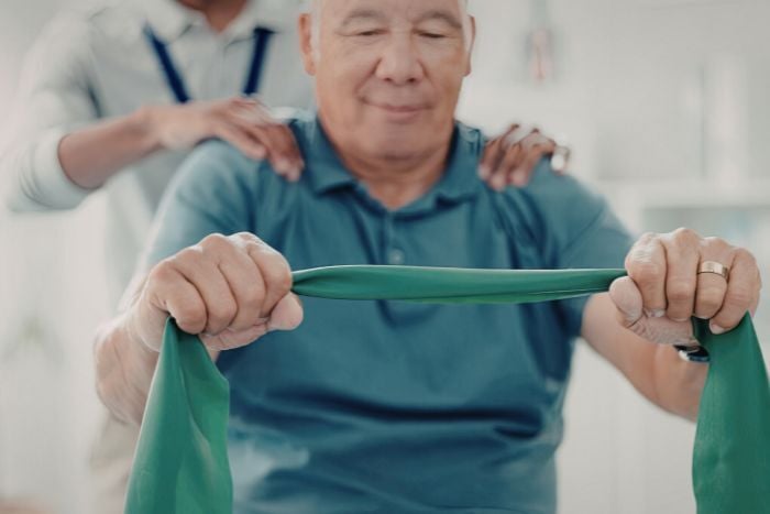 elderly-man-exercising-with-resistanceband
