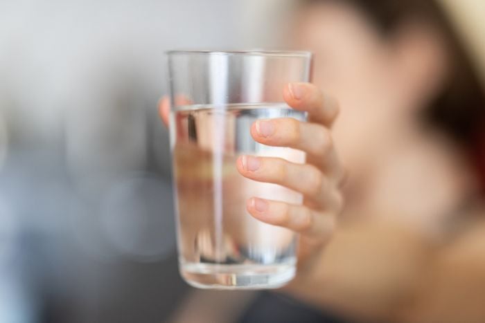person-holding-glass-of-water