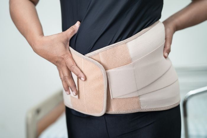 wearing-back-pain-support-belt