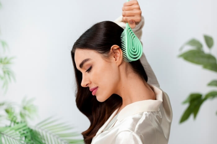 woman-doing-herself-scalp-massage