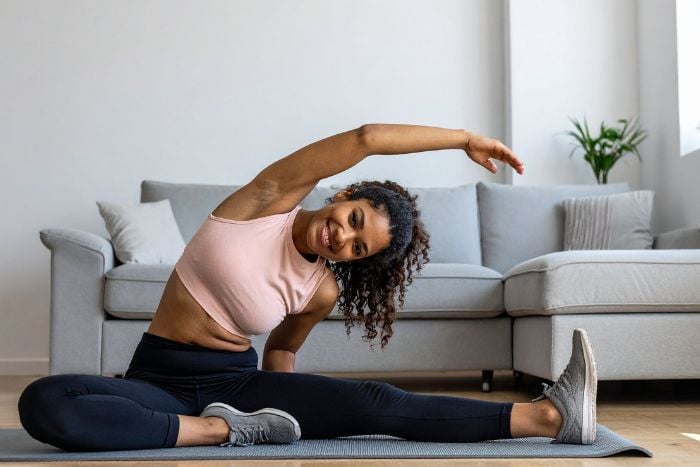 woman-stretching-during-home-workout