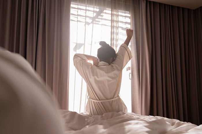woman-stretching-morning-wake-up