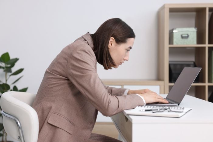 woman-with-poor-posture-working-in-office