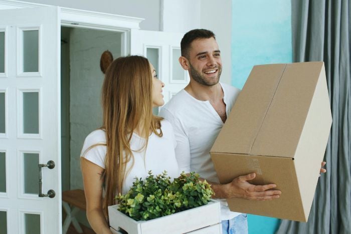 young-couple-moving-boxes