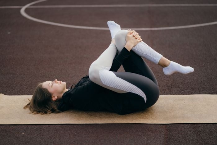 young-fit-woman-in-sportswear-trains